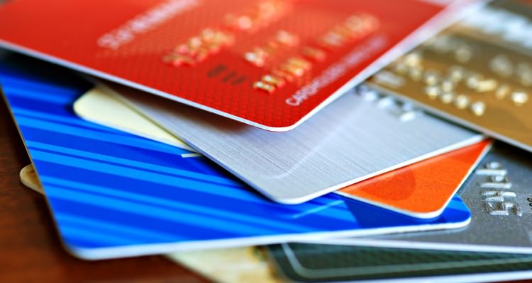 Colorful stack of credit cards and shopping gift cards.  Macro w