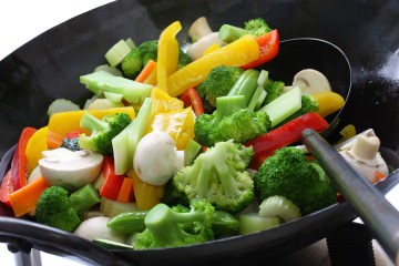 stir fried vegetables in a chinese wok